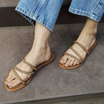 Three Strapped Tan Chained Flats