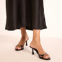 The Bare Black Heels