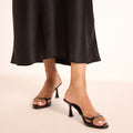 The Bare Black Heels