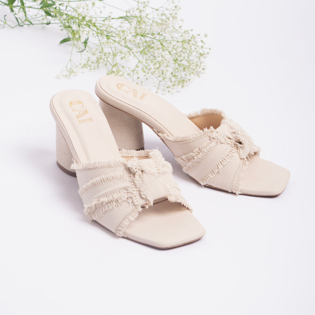 White Ruffled Heels