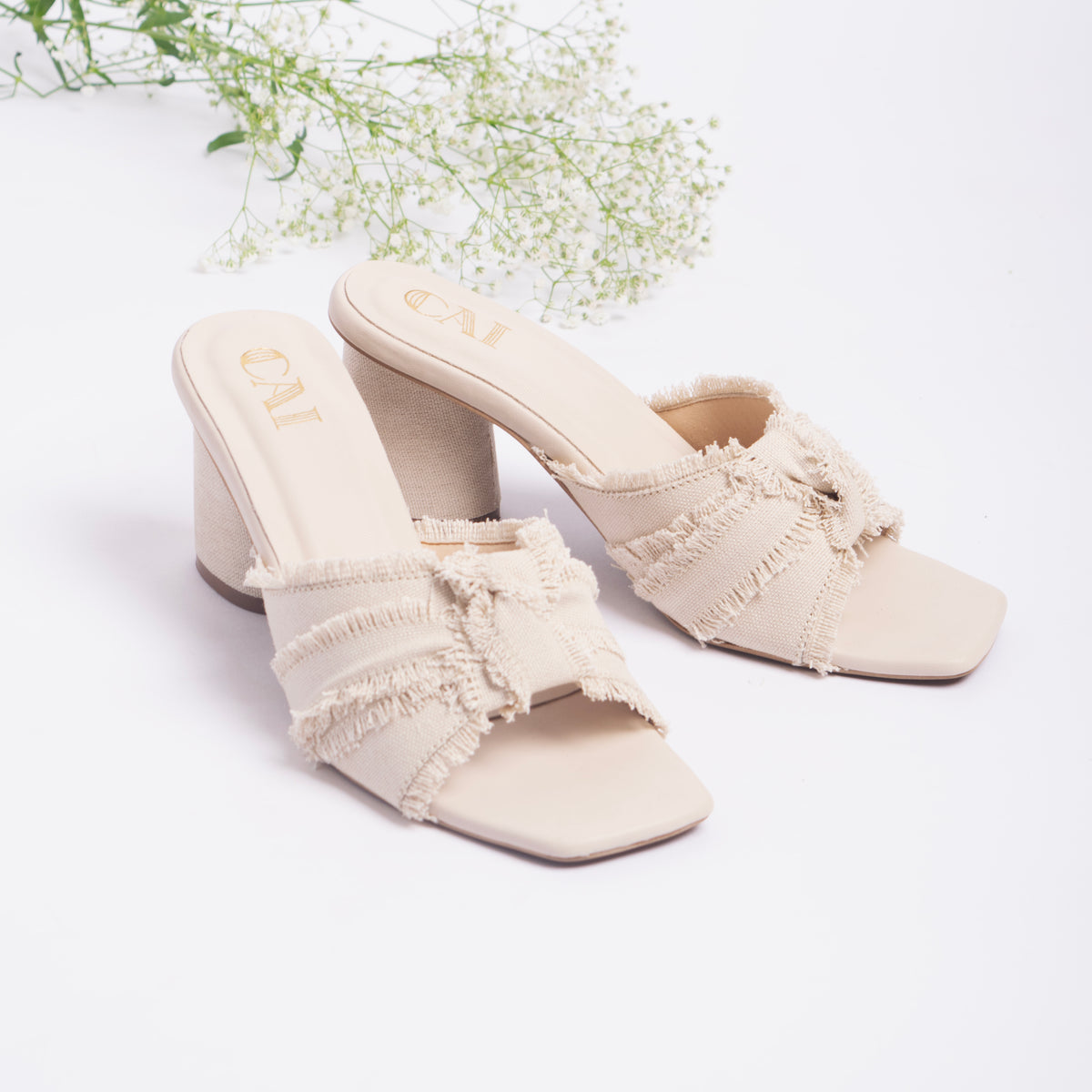 White Ruffled Heels