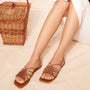 Tan puzzled flats